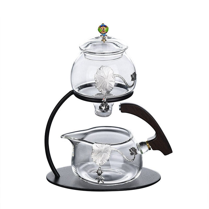 https://www.healthwisdom.shop/cdn/shop/files/Creative-Silver-Inlaid-Semi-automatic-Tea-Set-Heat-resistant-Glass-Kung-Fu-Tea-Set-Teapot-Teacup-14_700x700.jpg?v=1701549560